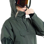 Volcom Women's Fern Insulated GORE-TEX Pullover 2024 - A dark green insulated pullover with a hood and black zipper.