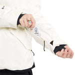 Volcom Women's Fern Insulated GORE-TEX Pullover 2024 - A cream-colored jacket with a black zipper and logo on the left chest, featuring a drawstring at the waist.