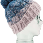 Volcom Women's Gradient Hand Knit Beanie 2023 - A blue and grey gradient beanie with a pom-pom on top, featuring a hand-knit design.