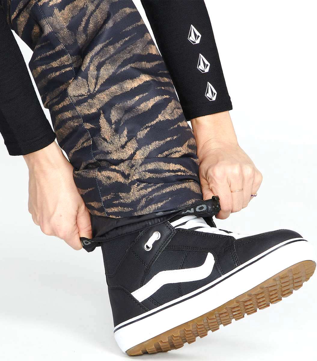 Volcom Women's Hallen Shell Pant 2023 - Black snow pants with a brown tiger stripe pattern on the upper thigh area.