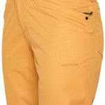 Volcom Women's Hallen Shell Pant 2023 - A pair of khaki-colored snow pants with a black zipper on the back pocket.