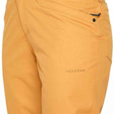 Volcom Women's Hallen Shell Pant 2023 - A pair of khaki-colored snow pants with a black zipper on the back pocket.