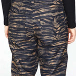 Volcom Women's Hallen Shell Pant 2023 - A pair of black and tan zebra-striped pants with a high waist, zip fly, and two back pockets.