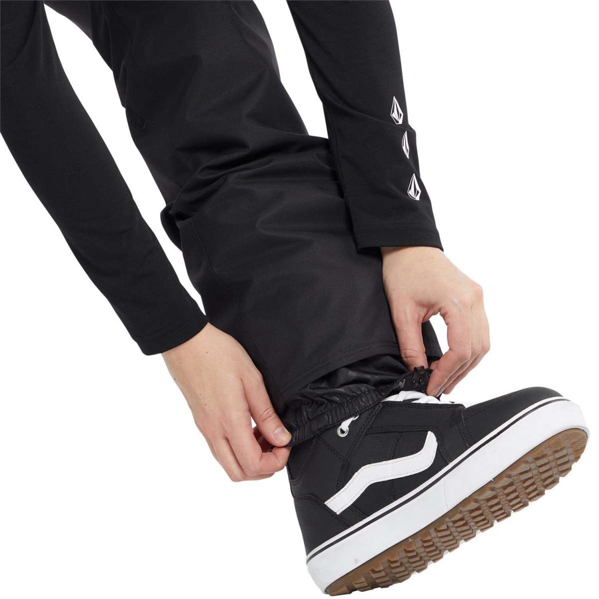 Volcom Women's Hallen Shell Pant 2024 - Black shell pant with white logo on left thigh and black drawstring at waist.