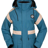 Volcom Women's Melancon GORE-TEX Jacket - A blue and tan jacket with a hood, featuring a black patch on the left chest area.