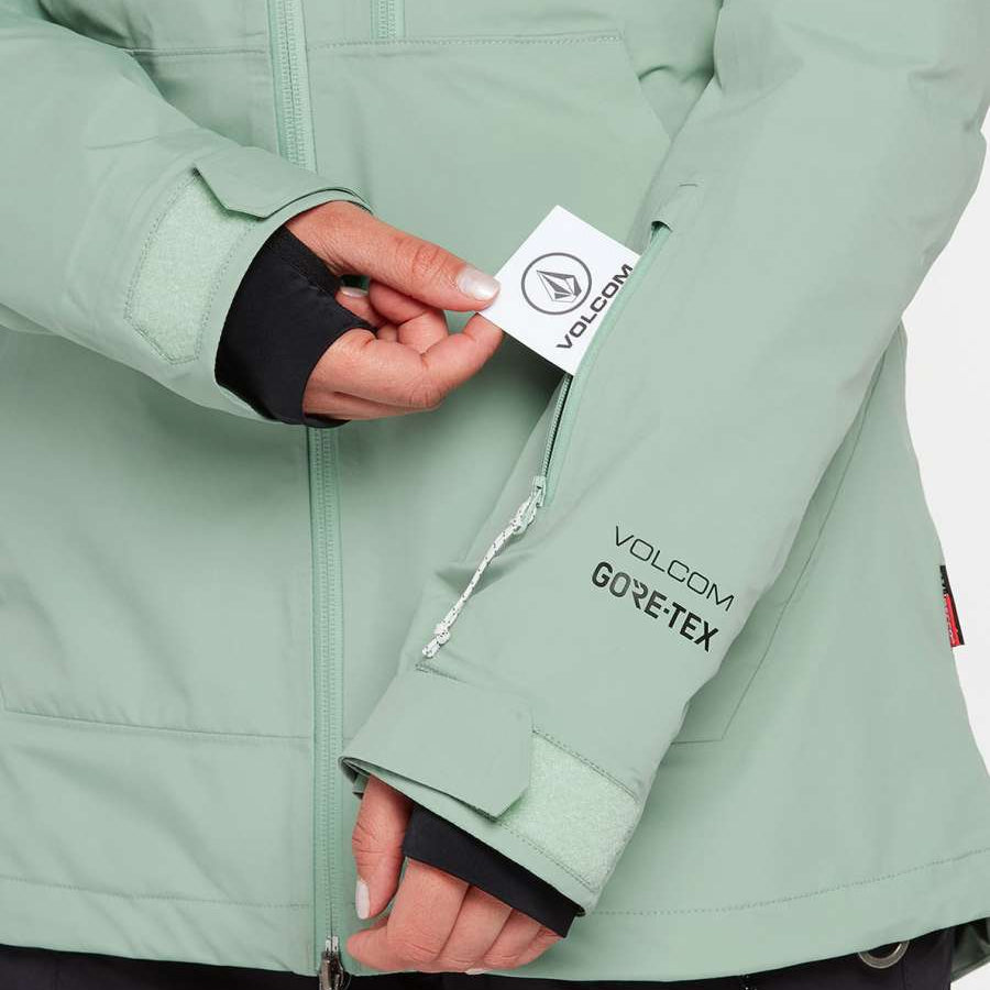Volcom Women's NYA TDS Infrared Gore Tex Jacket 2022 - A mint green jacket with a black zipper and black trim around the wrists.