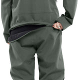Volcom Women's Shiloh Snow Suit 2024 - Dark green snowsuit with black zipper and logo on left chest, worn by a model from behind.