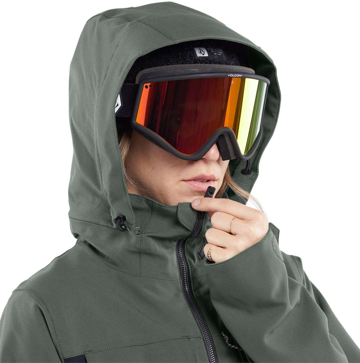 Volcom Women's Shiloh Snow Suit 2024 - A dark green snow suit with a black zipper and two zippered pockets on the front.