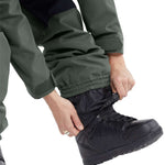 Volcom Women's Shiloh Snow Suit 2024 - A dark green snowsuit with a black zipper and white logo on the left chest.