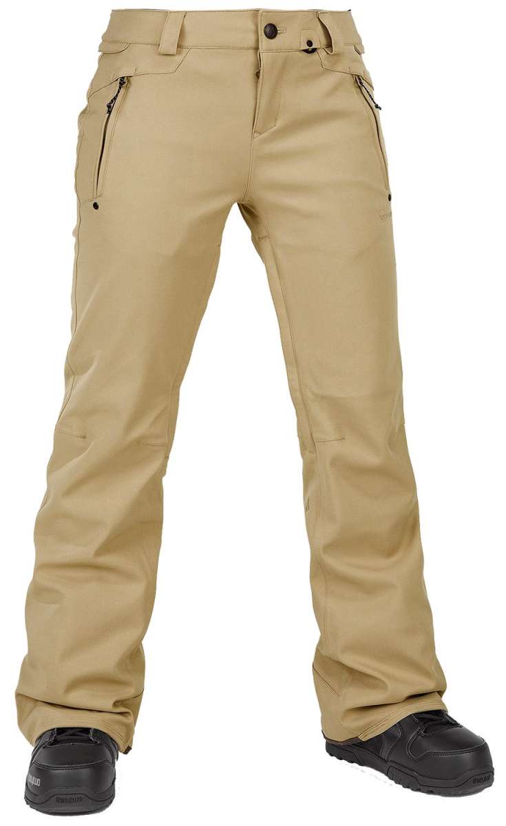Volcom Women's Species Stretch Pant - Beige pants with a subtle pattern of darker beige lines and small, dark-colored dots on the upper thigh area.