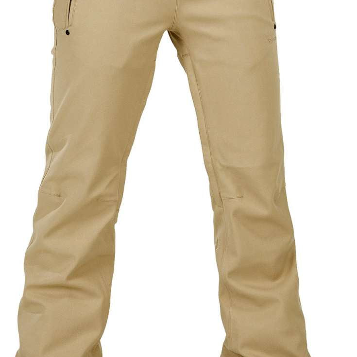 Volcom Women's Species Stretch Pant - Beige pants with a subtle pattern of darker beige lines and small, dark-colored dots on the upper thigh area.