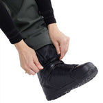 Volcom Women's Species Stretch Pant 2024 - A pair of black pants with a subtle patterned design on the upper thigh area.