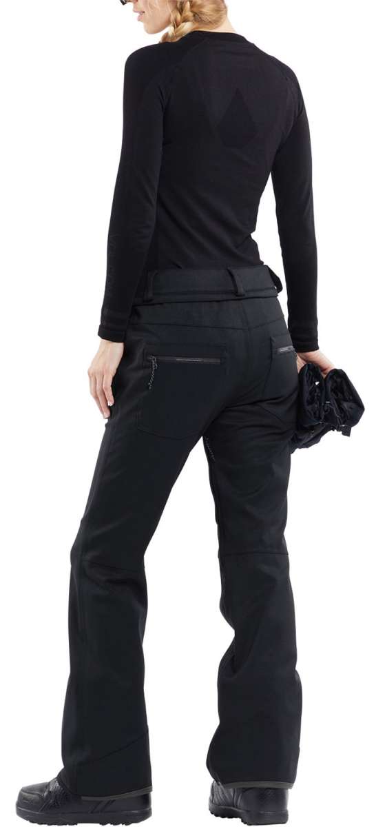 Volcom Women's Species Stretch Pant - Black pants with a subtle geometric pattern on the upper thigh area.