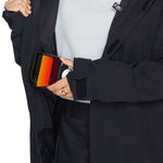 Volcom Women's T.T.T. 4 in 1 Jacket 2023 - A black jacket with a zippered chest pocket and two side pockets, featuring a hood and adjustable cuffs.