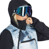 Volcom Women's T.T.T. 4 in 1 Jacket 2023 - A black and white tie-dye patterned jacket with a hood, worn by a model against a plain background.