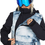 Volcom Women's T.T.T. 4 in 1 Jacket 2023 - A blue and white tie-dye patterned jacket with a black zipper, worn by a model against a plain background.