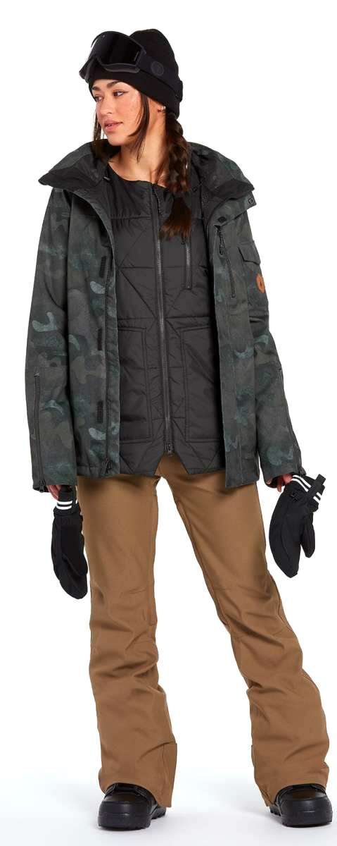 Volcom Women's Vault 4 in 1 Jacket - A black jacket with a quilted pattern and zippered pockets on both sides.