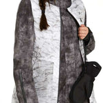 Volcom Women's Vault 4 in 1 Jacket - A black and white jacket with a marbled pattern, featuring a hood and zippered pockets.