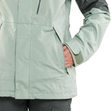 Volcom Women's V.Co Aris Insulated GORE-TEX Jacket 2024 - A light green jacket with a black zipper and two zippered pockets on either side.