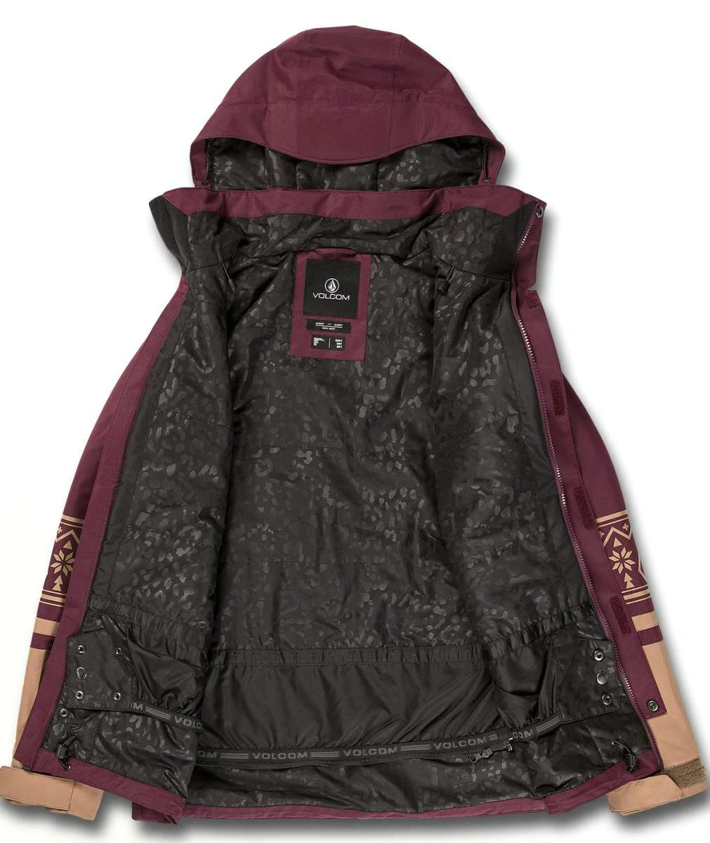 Volcom Women's Westland Insulated Jacket - A black jacket with a hood, featuring tan accents and a geometric pattern on the sleeve cuff.