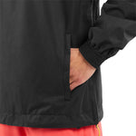 Volcom Longo Shell Pullover Jacket 2024 - A black jacket with a zippered front and elastic cuffs, featuring a small logo on the left chest.