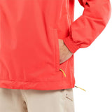 Volcom Longo Shell Pullover Jacket 2024 - A coral-colored jacket with a zippered chest pocket and yellow zipper pulls.