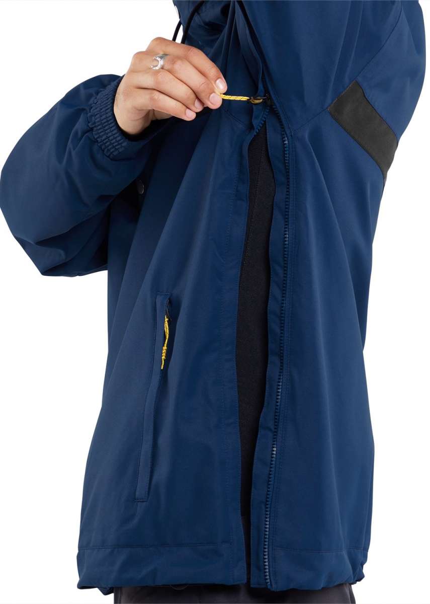 Volcom Longo Shell Pullover Jacket - A navy blue jacket with a zippered front and two pockets on either side, featuring a hood and adjustable cuffs.