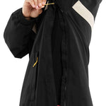 Volcom Longo Shell Pullover Jacket - A black jacket with a white stripe on the side, featuring a zipper and drawstring at the waist.