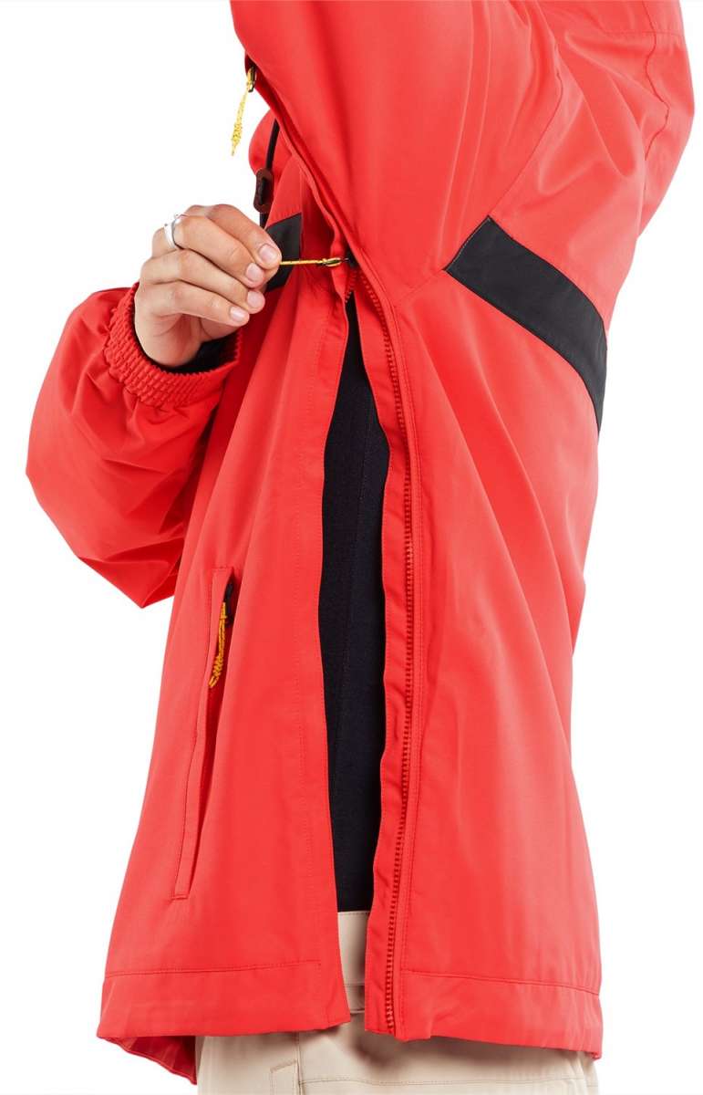 Volcom Longo Shell Pullover Jacket - A red jacket with a black zipper and yellow pull tab, worn by a model from behind.