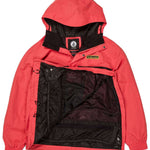 Volcom Longo Shell Pullover Jacket 2024 - A coral-colored jacket with a hood, featuring a black zipper and two zippered pockets on the front.