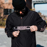 Volcom Pack It USA GORE-TEX Jacket 2022 - A black jacket with a white American flag patch on the left sleeve and a small logo on the right chest.