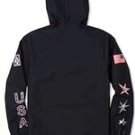 Volcom Pack It USA GORE-TEX Jacket 2022 - A black jacket with a hood, featuring an American flag patch on the left sleeve and a Volcom logo patch on the right sleeve.