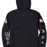 Volcom Pack It USA GORE-TEX Jacket 2022 - A black jacket with a hood, featuring an American flag patch on the left sleeve and a Volcom logo patch on the right sleeve.