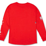 Volcom True to This USA Long Sleeve Tee 2022 - A red long-sleeved shirt with a small American flag on the front and white lettering that reads "True to This".