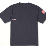 Volcom USA Stone Short Sleeve Tee 2022 - A dark gray t-shirt with a small red and white striped American flag on the left sleeve.