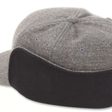 Volcom USA Winter Hat 2022 - A gray winter hat with a pom-pom on top and a faux fur trim around the edge of the brim.