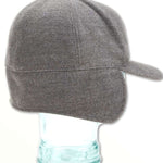 Volcom USA Winter Hat 2022 - A gray winter hat with a pom-pom on top and a faux fur trim around the edge of the brim.