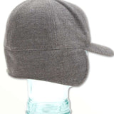 Volcom USA Winter Hat 2022 - A gray winter hat with a pom-pom on top and a faux fur trim around the edge of the brim.