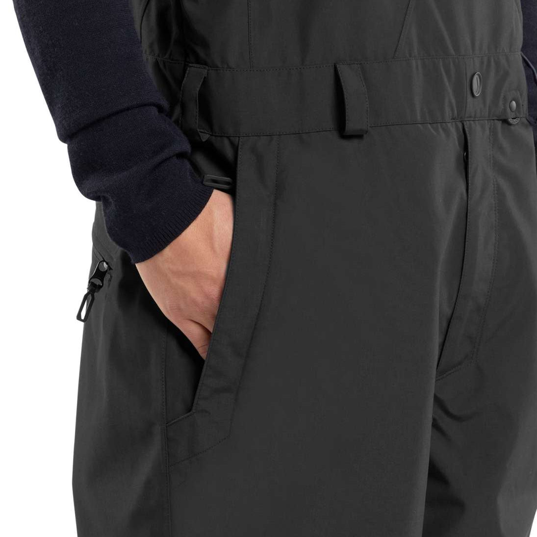 Volcom V.Co Sparta Bib Overall Pants 2024 - Black bib overall pants with a white logo on the left leg and black drawstring waistband.