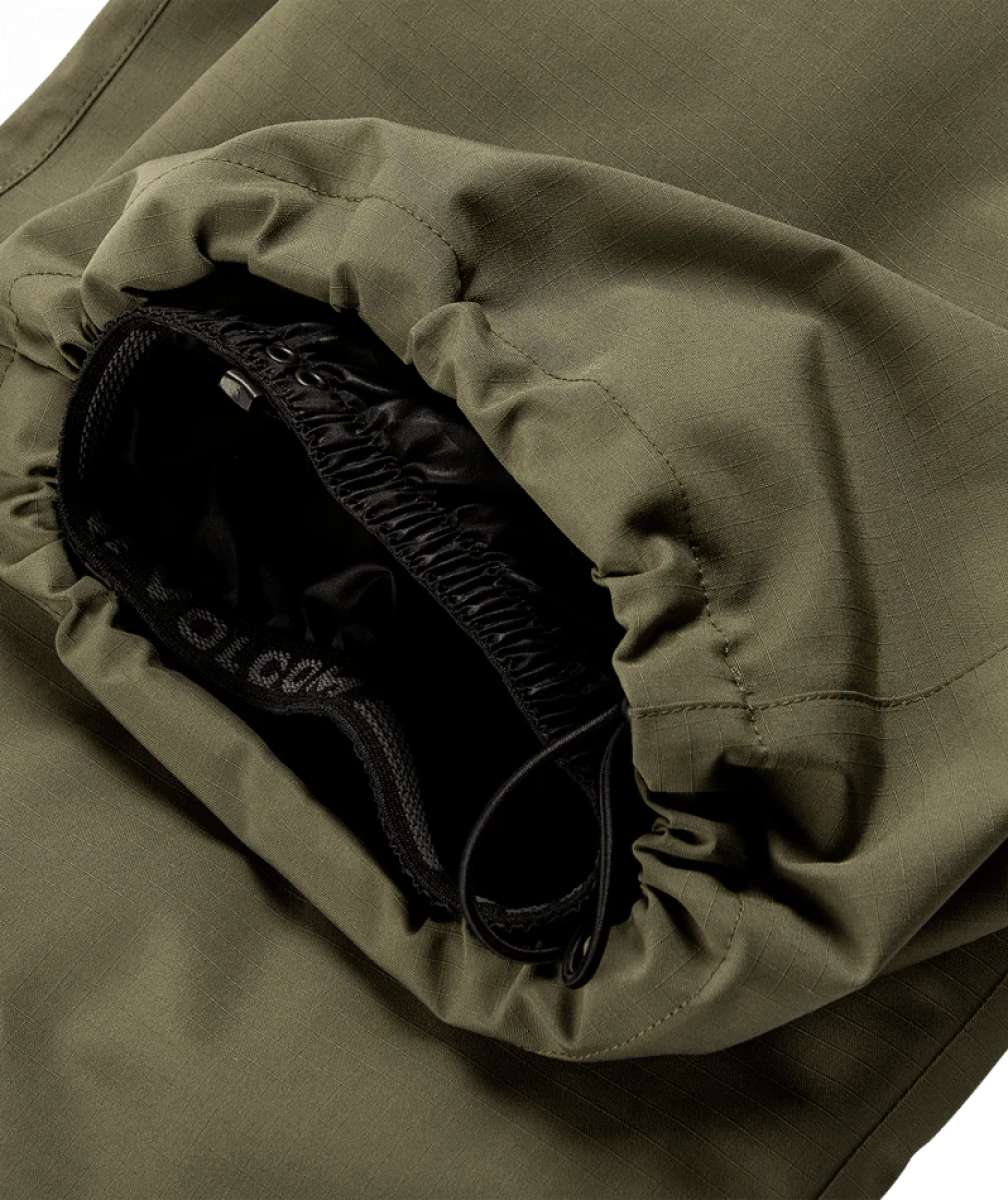 Volcom X Dustbox Pant 2024 - Olive green pants with a subtle grid pattern and black drawstring.