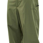 Volcom X Dustbox Pant 2024 - Olive green pants with a subtle black logo on the left thigh and two zippered pockets on the right side.