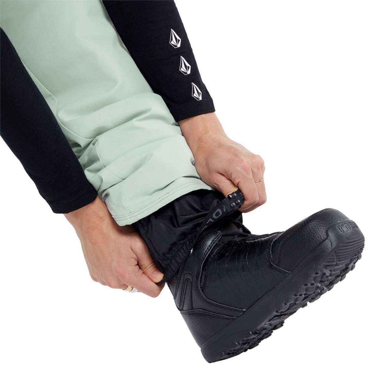 Volcom Women's Frochickie Insulated Pant - Black snow pants with white logo on left leg cuff.