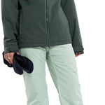 Volcom Women's Frochickie Insulated Pant 2024 - A dark green insulated ski pant with a white stripe on the side of the leg.