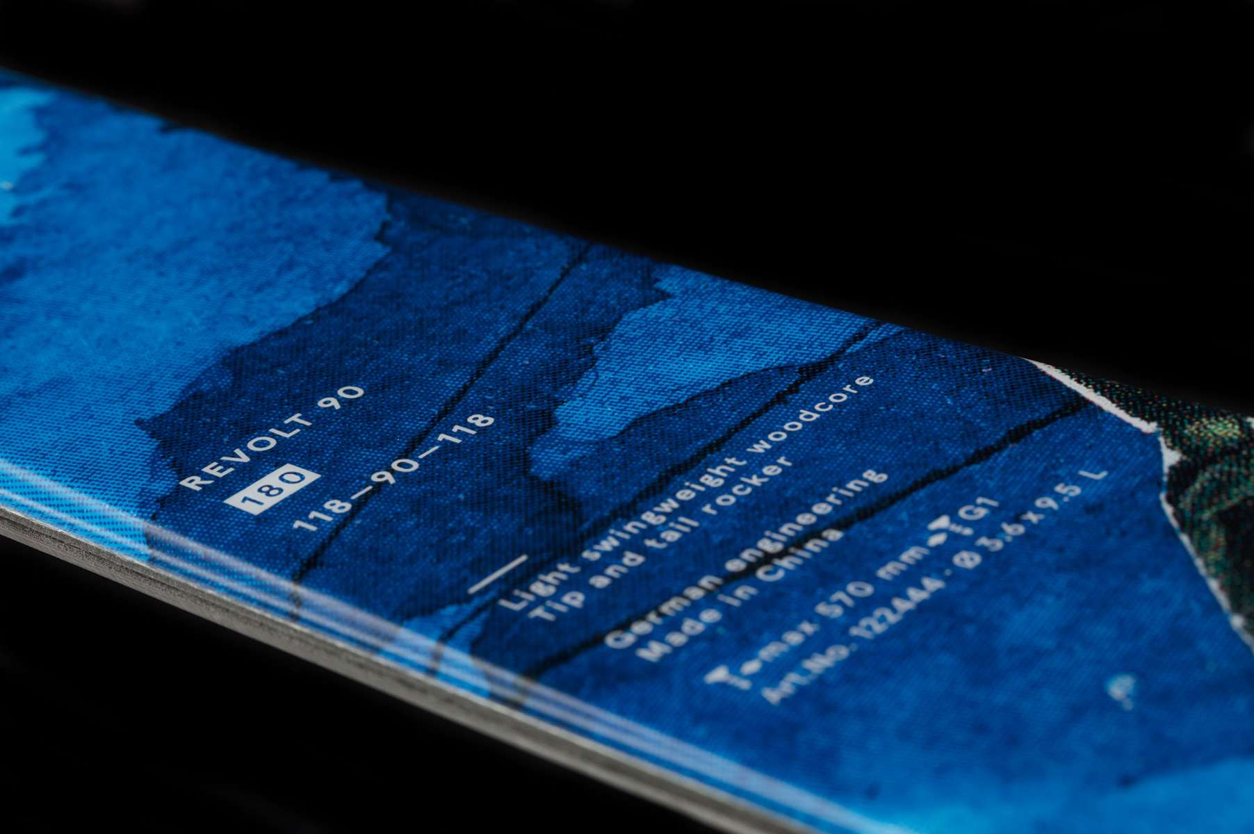 Volkl Revolt 90 Flat Ski 2022-2023 - A blue ski with a white logo on top and black writing along the side.