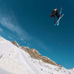 Volkl Revolt 90 Flat Ski 2022-2023 - A black ski with a white stripe down the middle and red lettering on the top of the blade.