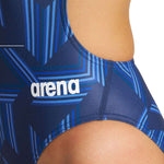 Arena Women's Puzzled Challenge Back One Piece Swimsuit - A blue one-piece swimsuit with a geometric pattern of light and dark blue shapes.
