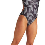 Arena Women's Puzzled Challenge Back One Piece Swimsuit - A black one-piece swimsuit with a white geometric pattern of lines and shapes.