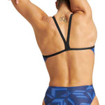 Arena Women's Puzzled Challenge Back One Piece Swimsuit - A blue one-piece swimsuit with a geometric pattern of light and dark blue lines on a darker blue background.