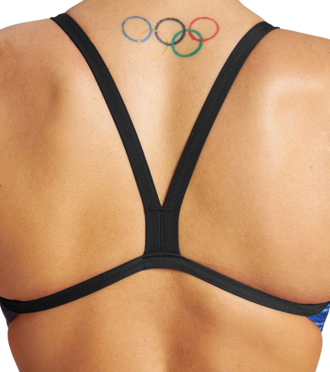 Arena Women's Puzzled Challenge Back One Piece Swimsuit - A blue and black one-piece swimsuit with a geometric pattern on the torso and back, featuring a high-cut leg design.