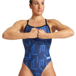Arena Women's Puzzled Challenge Back One Piece Swimsuit - A blue one-piece swimsuit with a geometric pattern of light and dark blue lines, featuring a black trim around the edges.